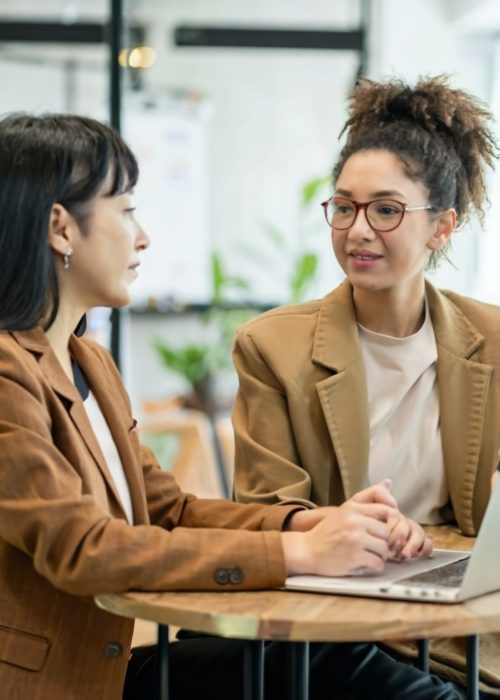 photo-three-business-women-working-project-office-multi-ethnic-environment